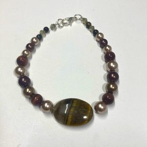 Handmade beaded bracelet with cat’s eyes and tiger’s eye brown and gold.